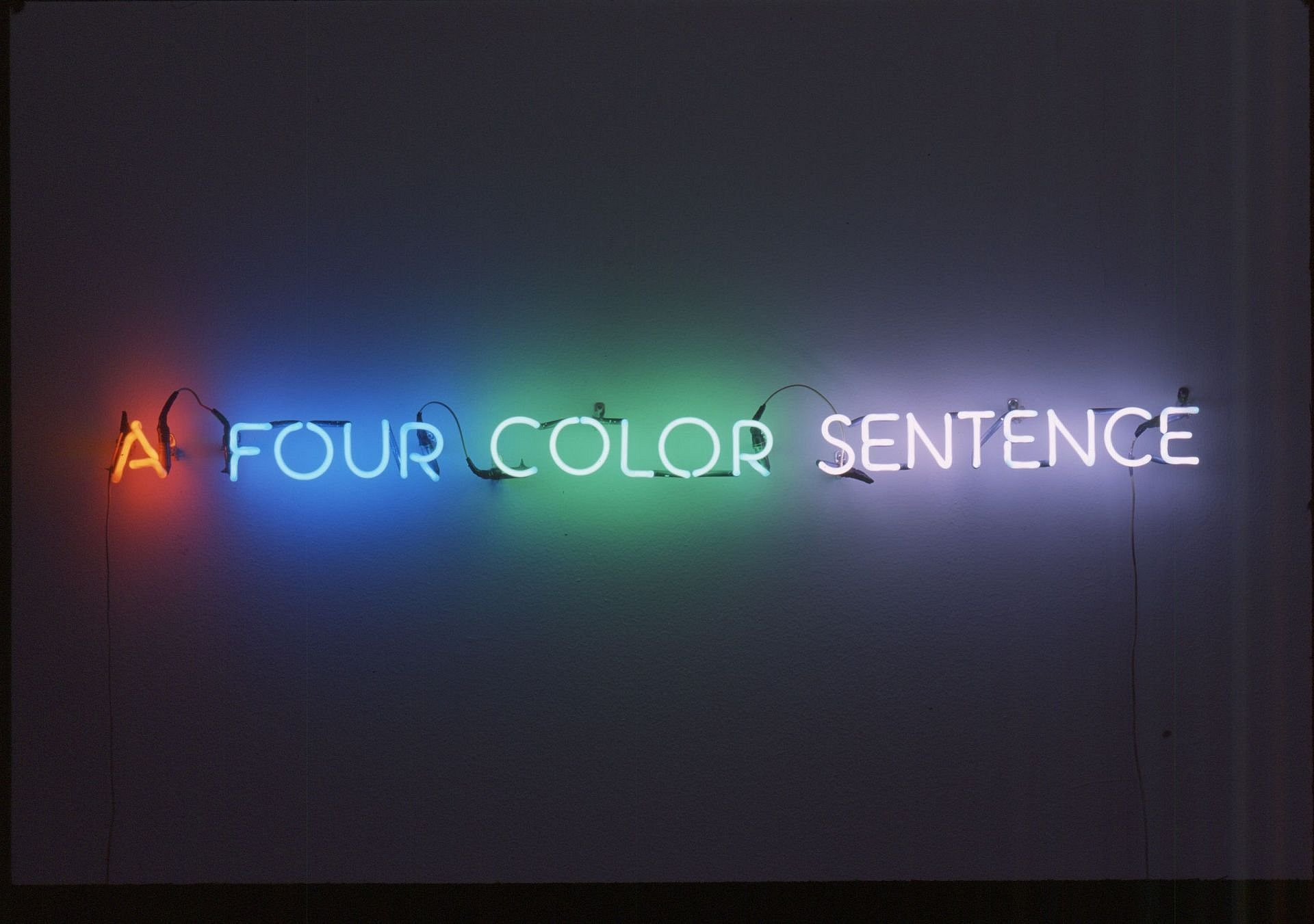 Neonschrift an einer Wand