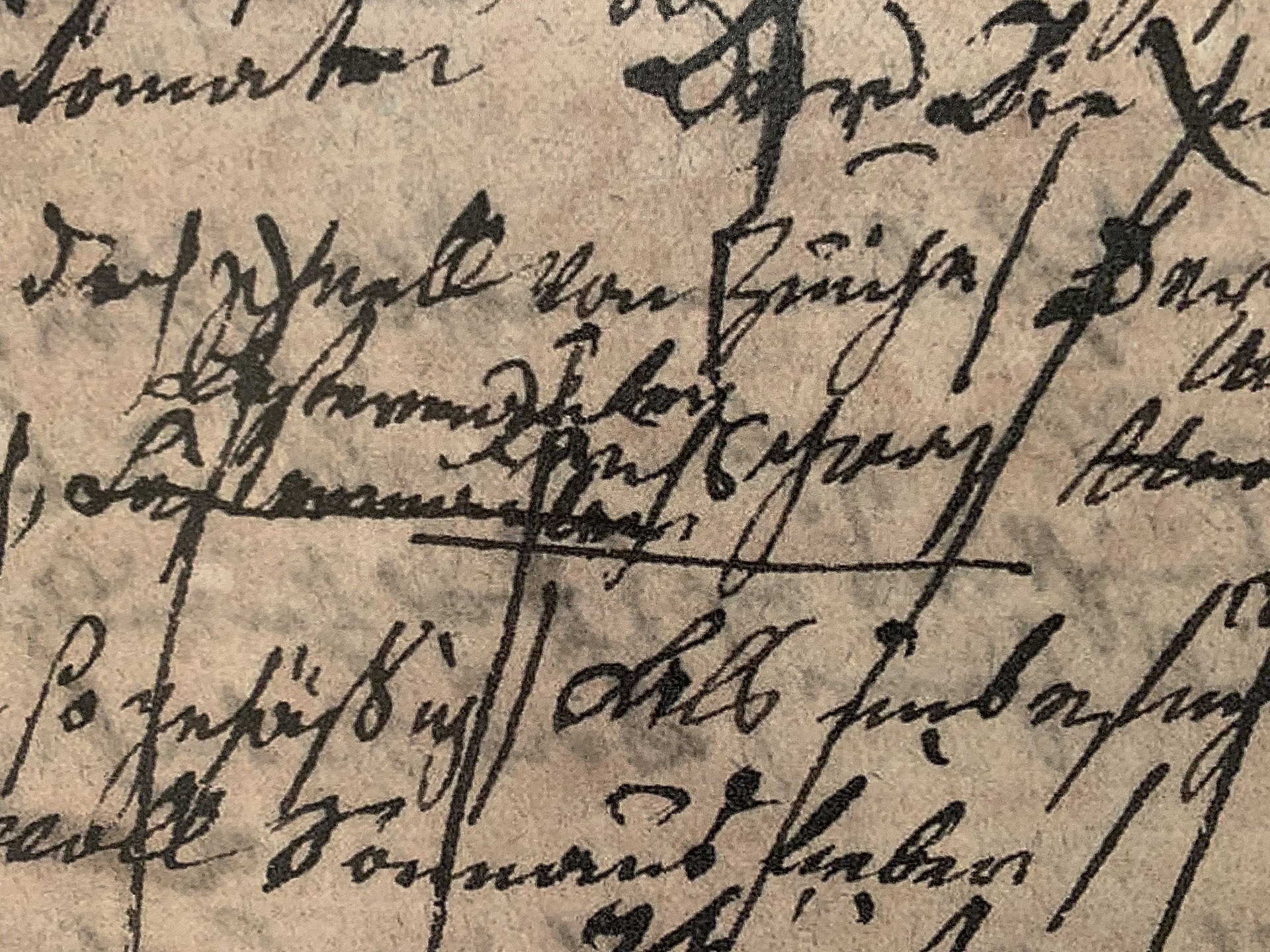 Close-Up einer unleserlichen Handschrift