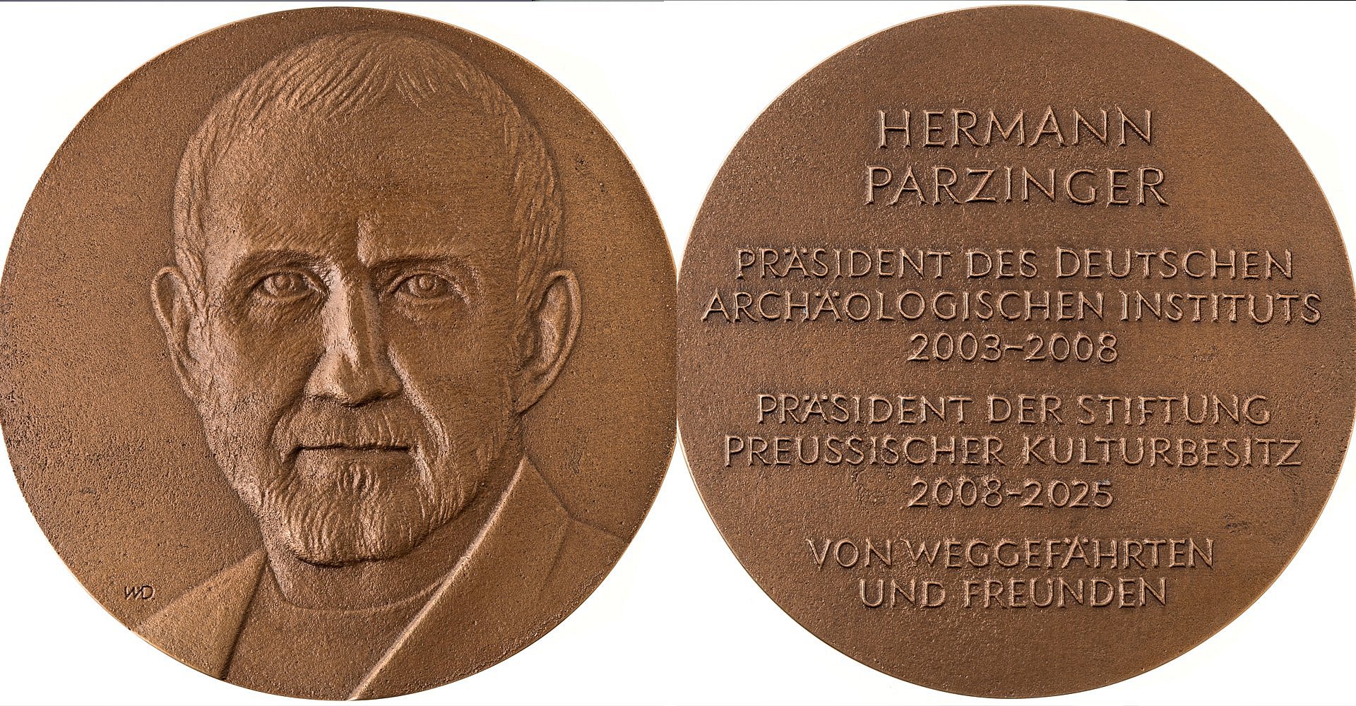 Vor- und Rückseite einer bronzenen Medaille